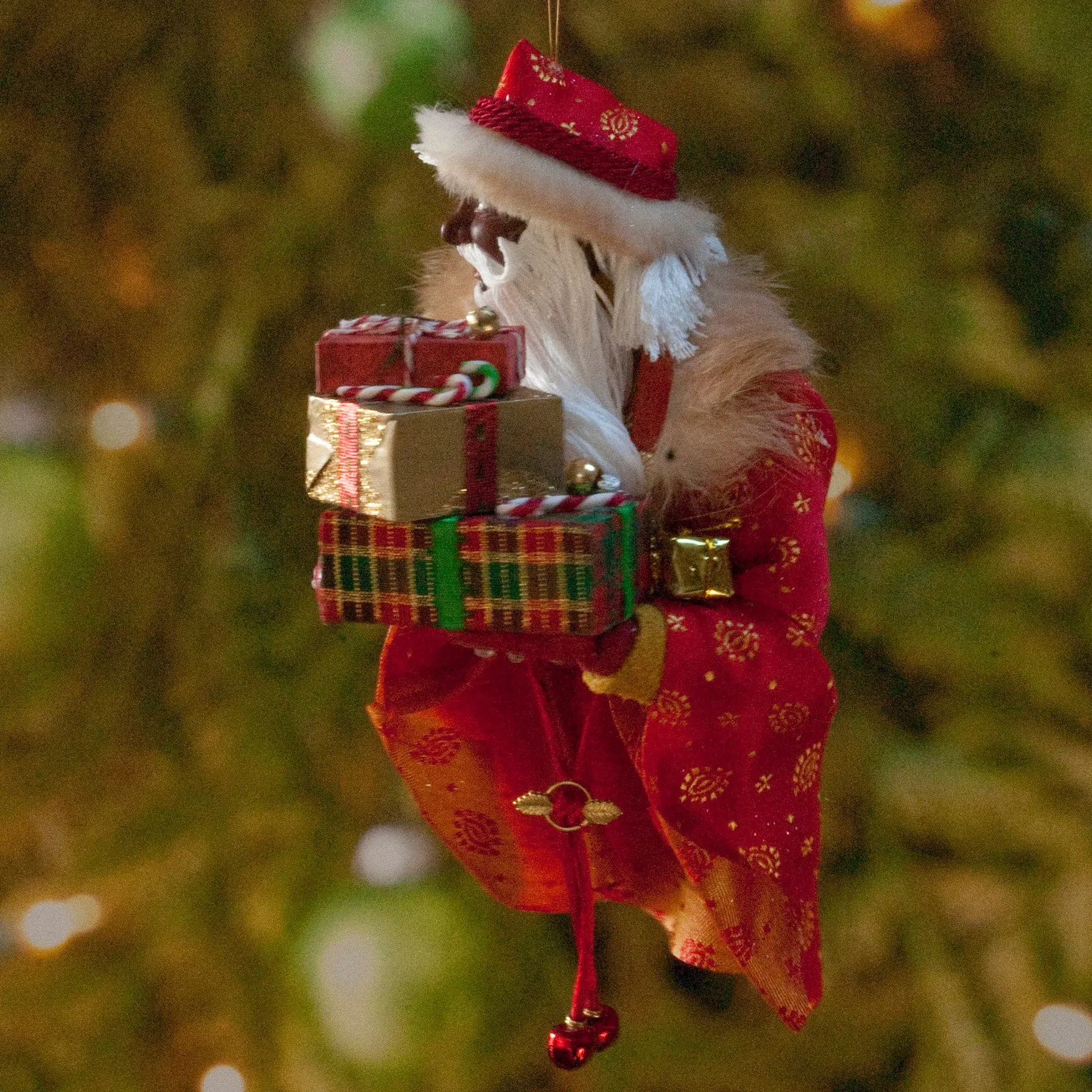 African American Santa Claus Decoration - Arm full of Christmas presents - Richly textured fur trimmed red and gold coat & cap - Golden mittens
