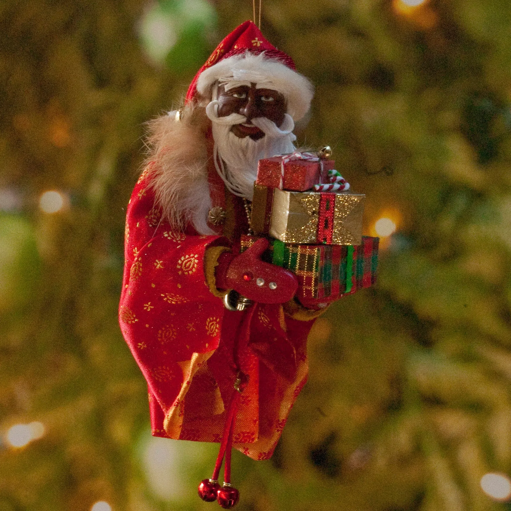 African American Santa Claus Decoration - Arm full of Christmas presents - Richly textured fur trimmed red and gold coat & cap - Golden mittens