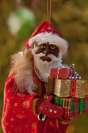 African American Santa Claus Decoration - Arm full of Christmas presents - Richly textured fur trimmed red and gold coat & cap - Golden mittens